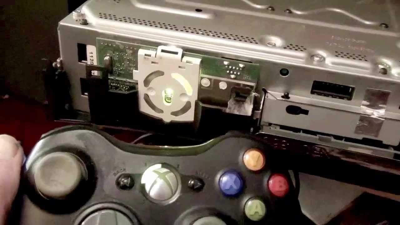 Corroded metal battery terminals inside a game controller showing signs of wear.