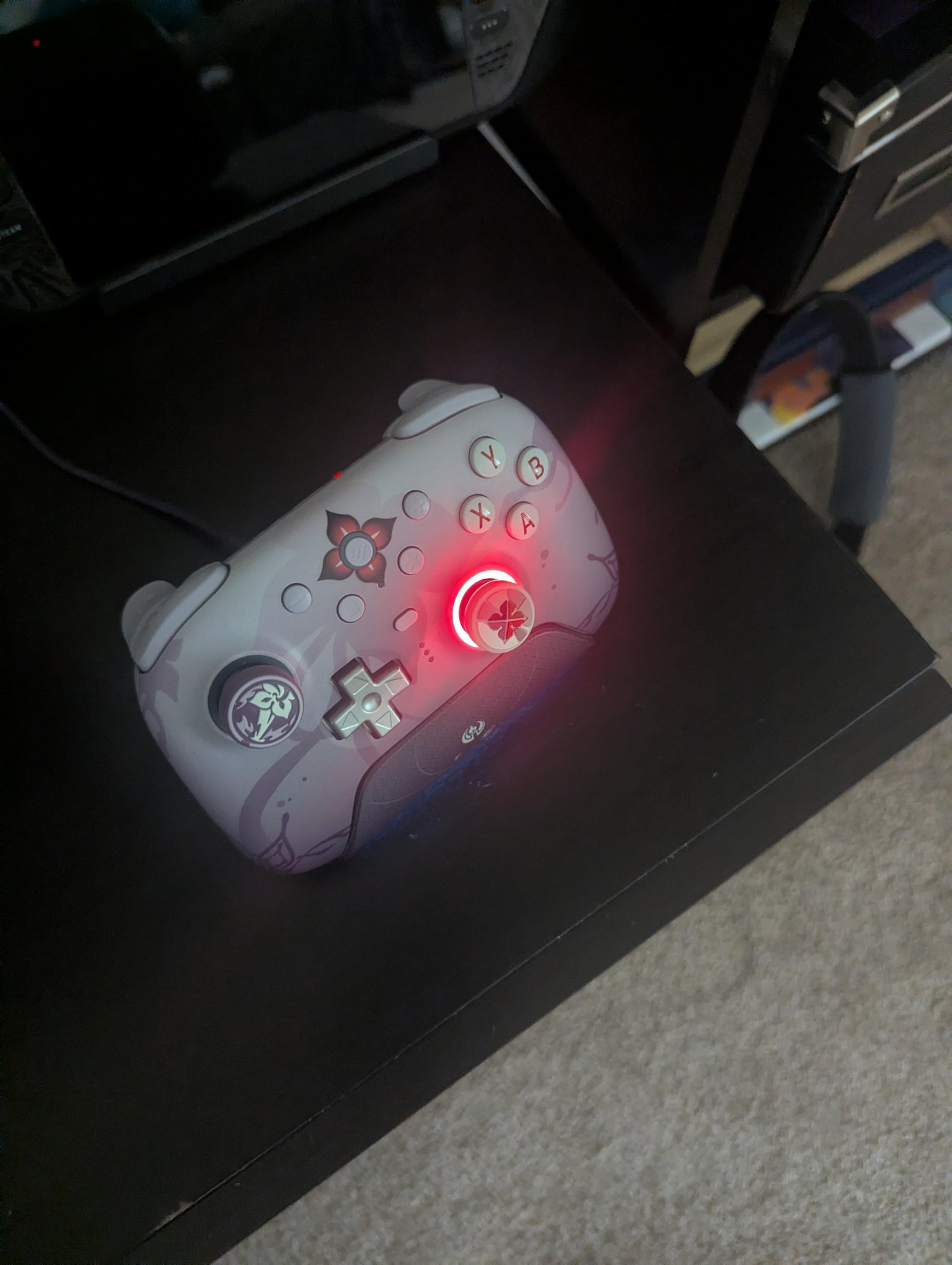A clean workspace with an 8BitDo Pro 2 controller ready for troubleshooting.
