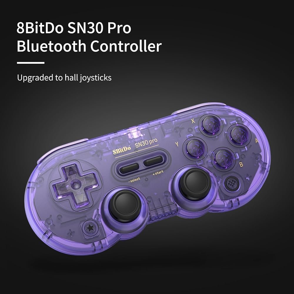 An 8BitDo SN30 Pro controller placed neatly on a shelf with gaming accessories.