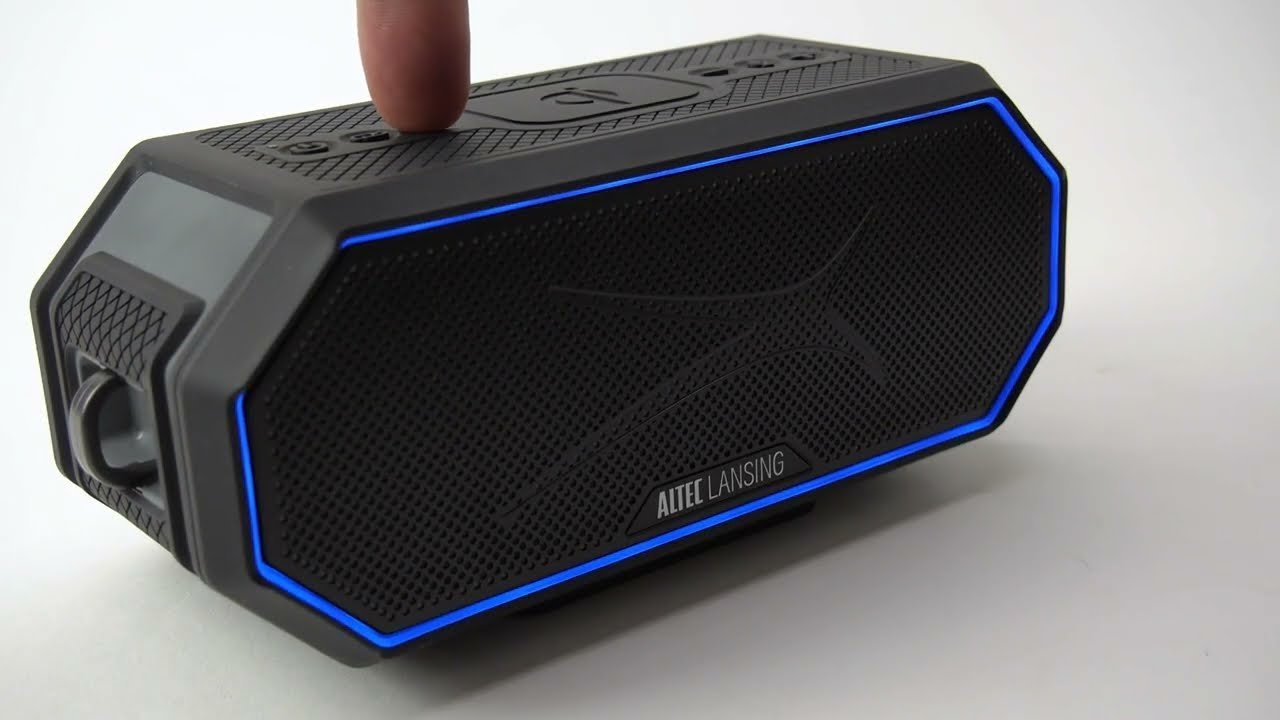 Resetting a portable speaker using a paperclip in the small pinhole.