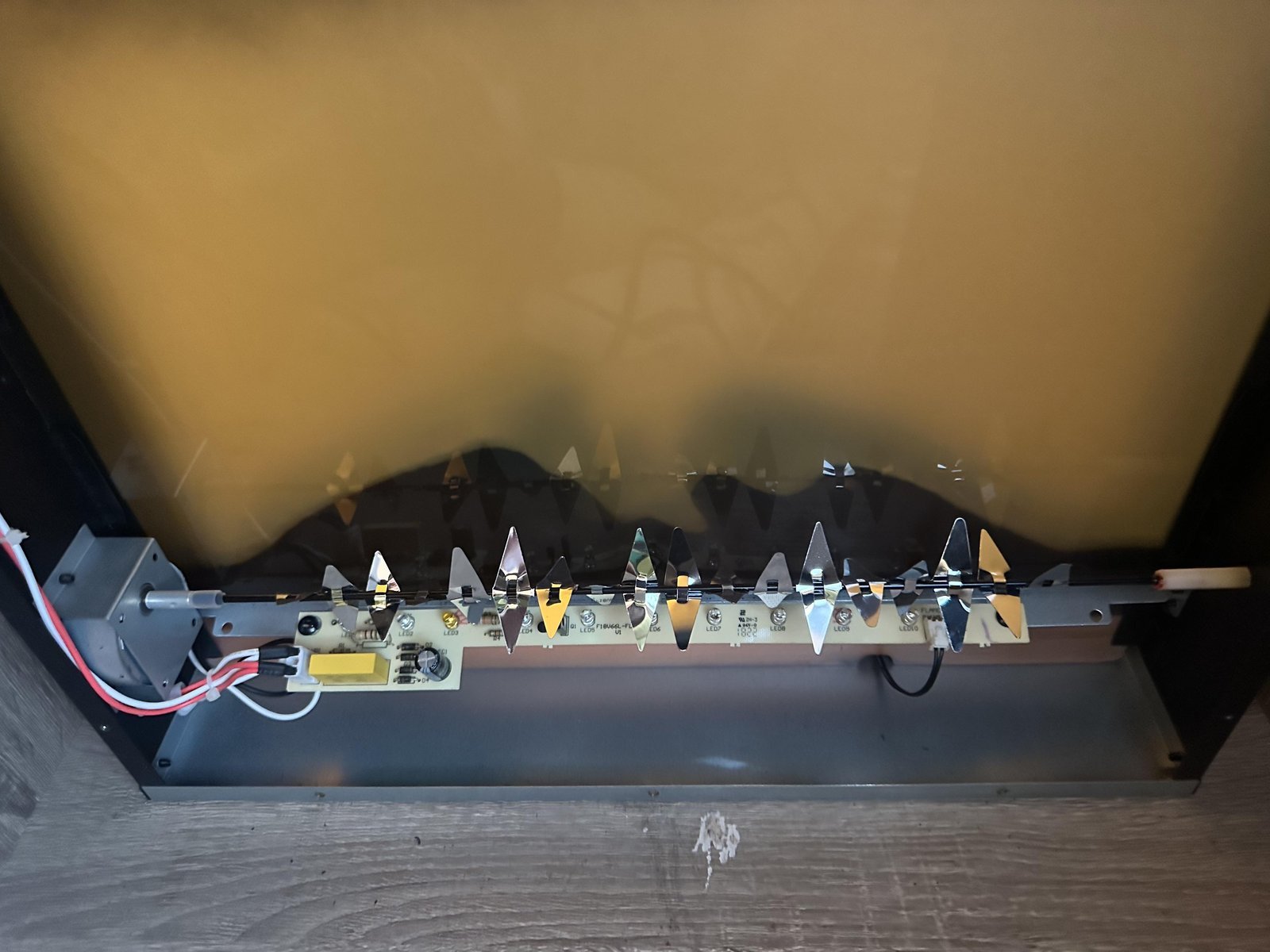 Basic electrical repair tools neatly organized on a clean wooden surface.