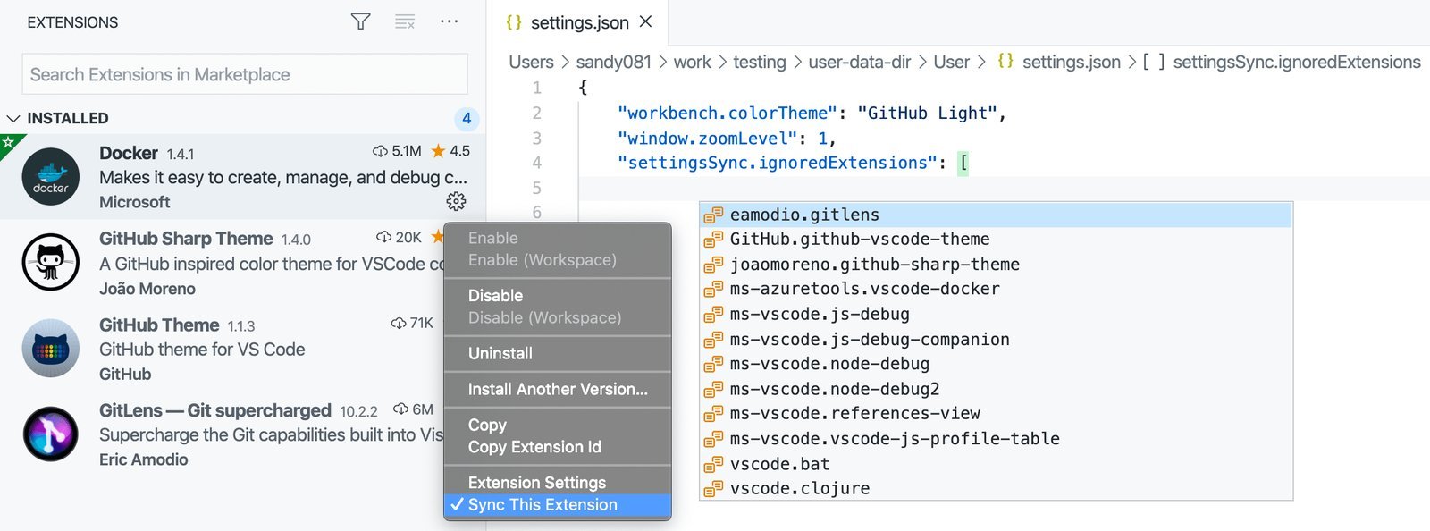 A user checking the account sync status icon in the VS Code software interface.