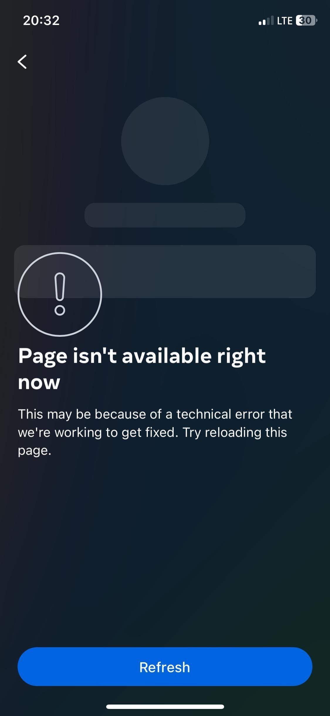 A person troubleshooting a smartphone that is not loading content on a desk.