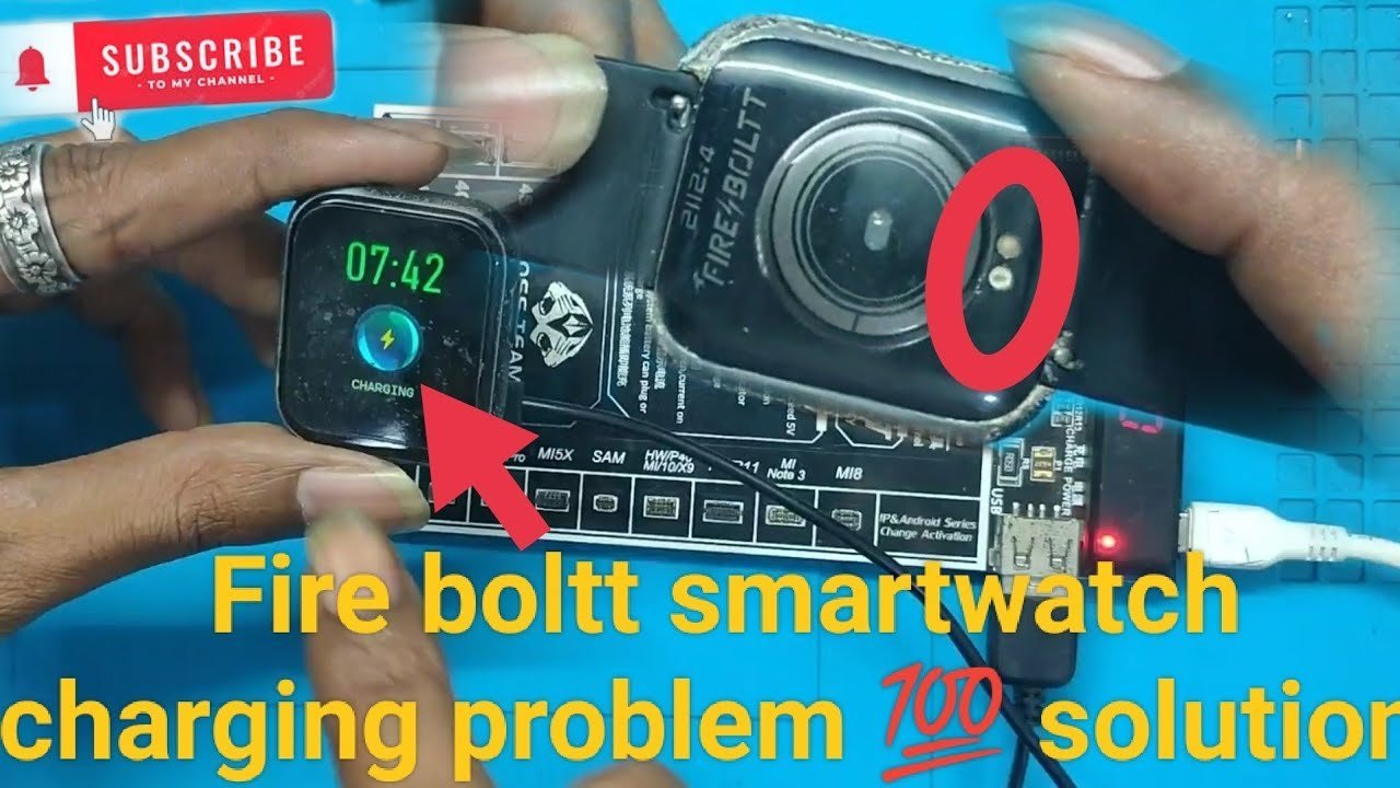 A Fire Boltt smartwatch charging on a table to recover from deep discharge.