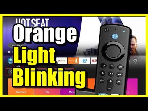 Hands pressing specific buttons on a remote to initiate a factory reset.
