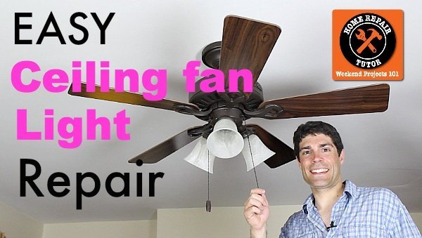 A homeowner inspecting the electrical wiring of a ceiling fan light fixture.