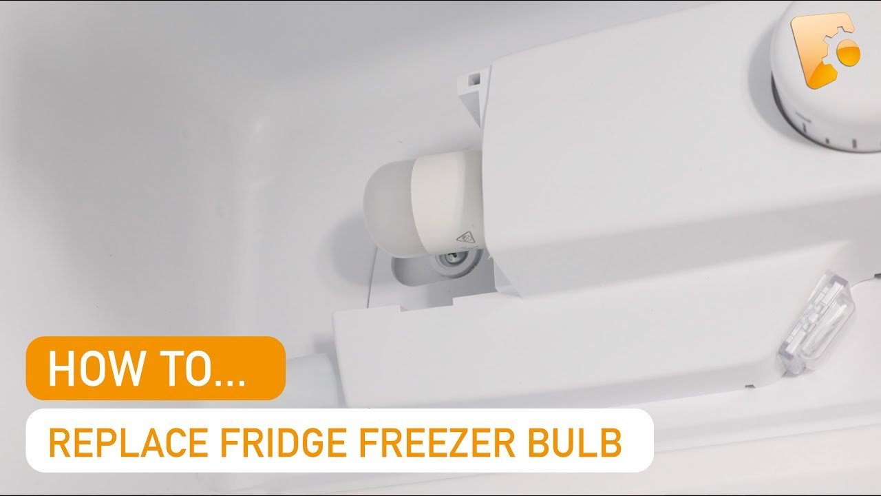 Close up view of the internal light bulb housing inside a refrigerator.