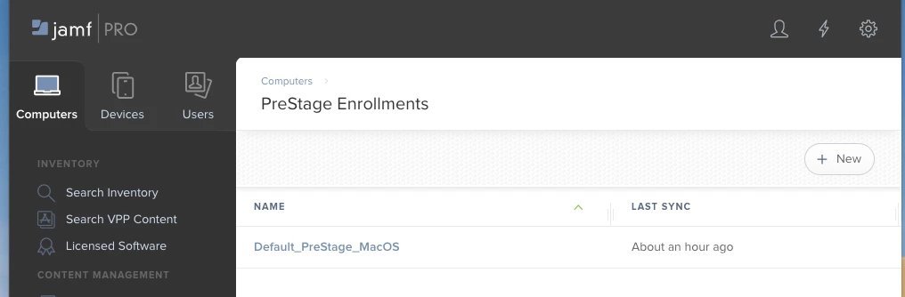 A laptop screen displaying Jamf Pro settings to troubleshoot enrollment sync issues.